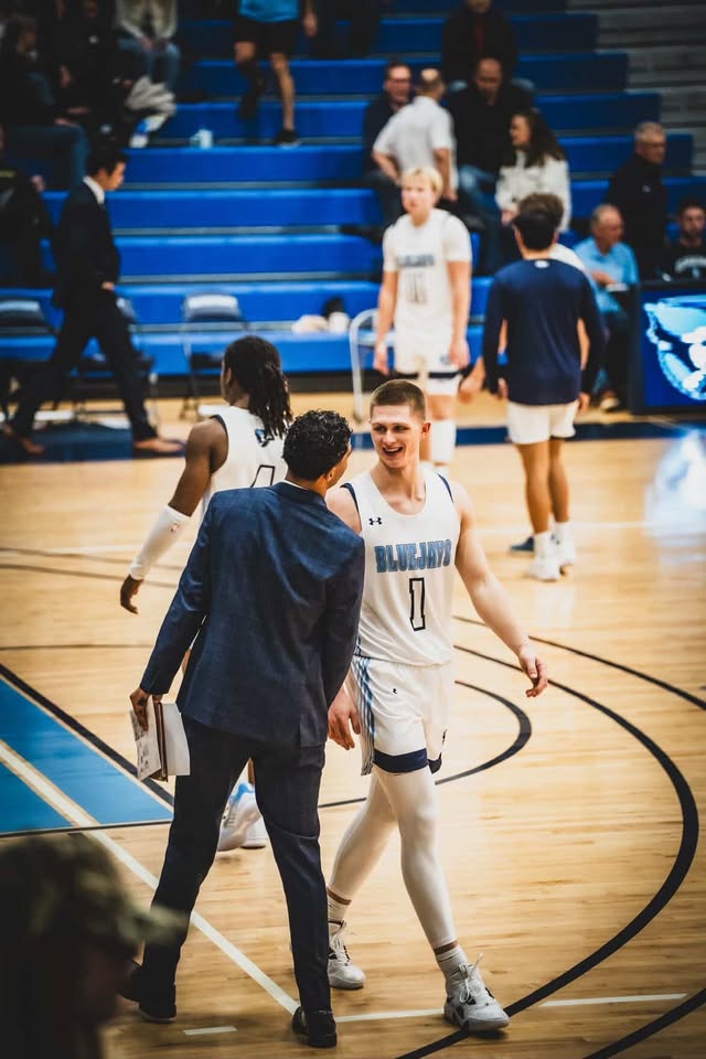 Dominic Trelenberg on the court for Elmhurst Bluejays